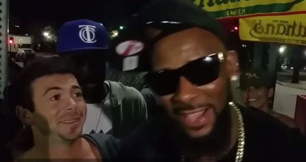 Drunk Guy Can't Believe He Met R. Kelly, Tries To Outsing Him