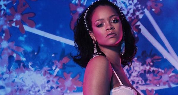Rihanna Strips Down To Lace Lingerie (Pics)