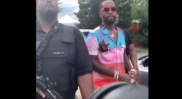 Watch Safaree Pull Up With Serious Security