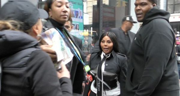 Lil Kim Almost Attacked By Animal Rights Protester