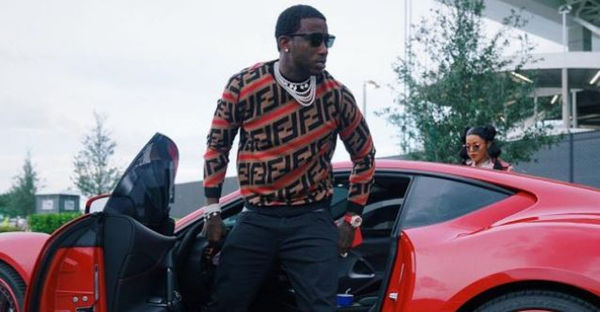 Watch Gucci Mane React To His Ferrari Getting Towed And Damaged