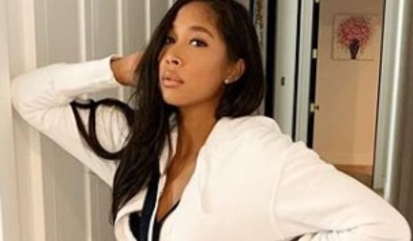 Watch Apryl Jones Work the Stripper Pole in a Thong Swimsuit