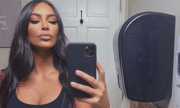 Kim Kardashian Heats Things Up With Topless, Cleavage Pic