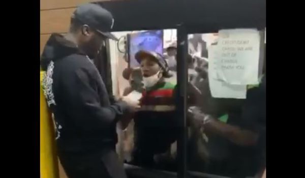 Watch 50 Cent Hand Out Money to Queens Burger King Workers