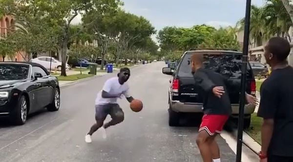 Young Buck Pulls Up In His Rolls Royce & "Dunks" On A Guy